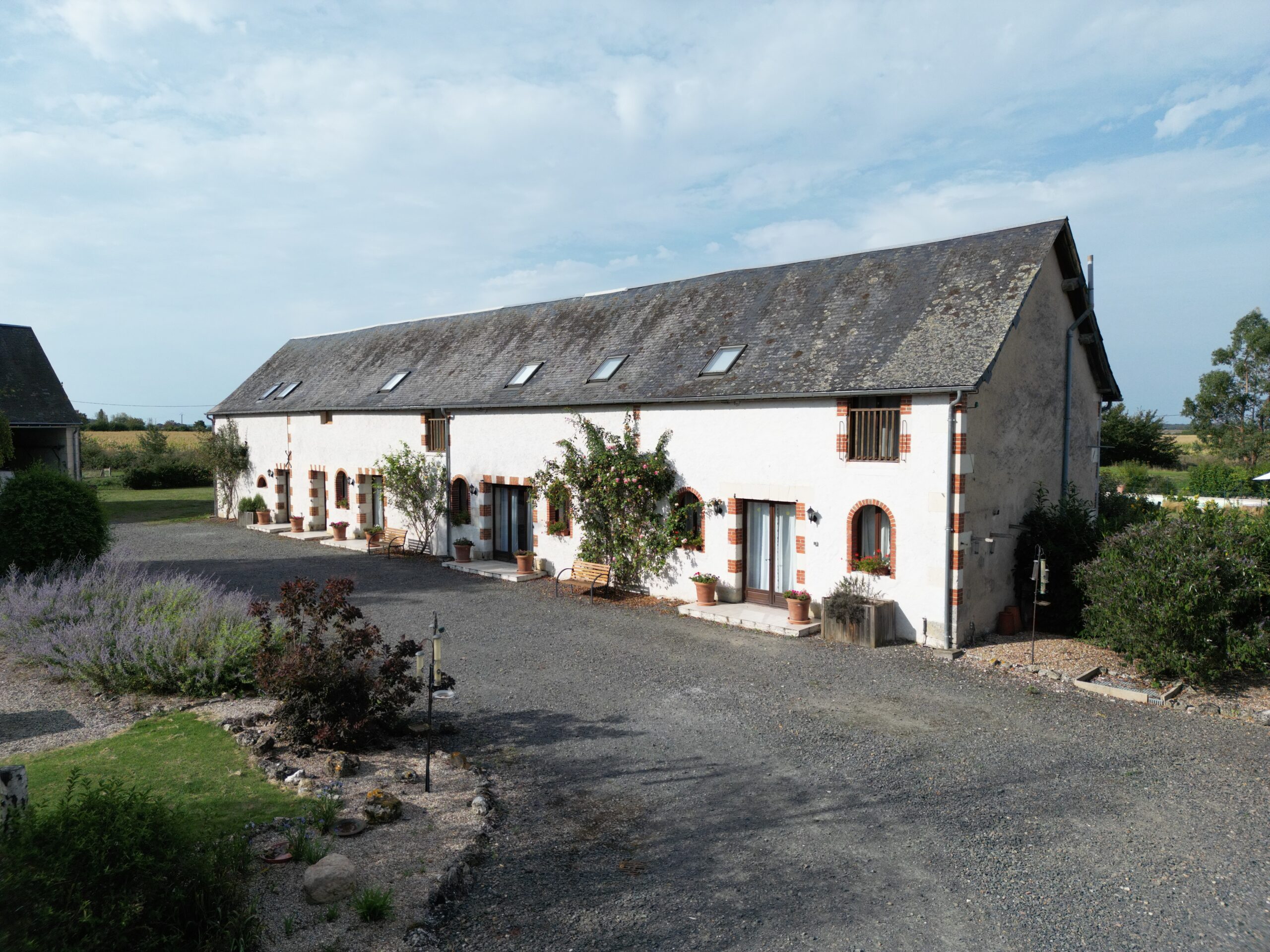 Gite frontages face onto a large courtyard with plenty of space to park